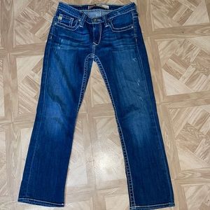 low waisted dark blue jeans